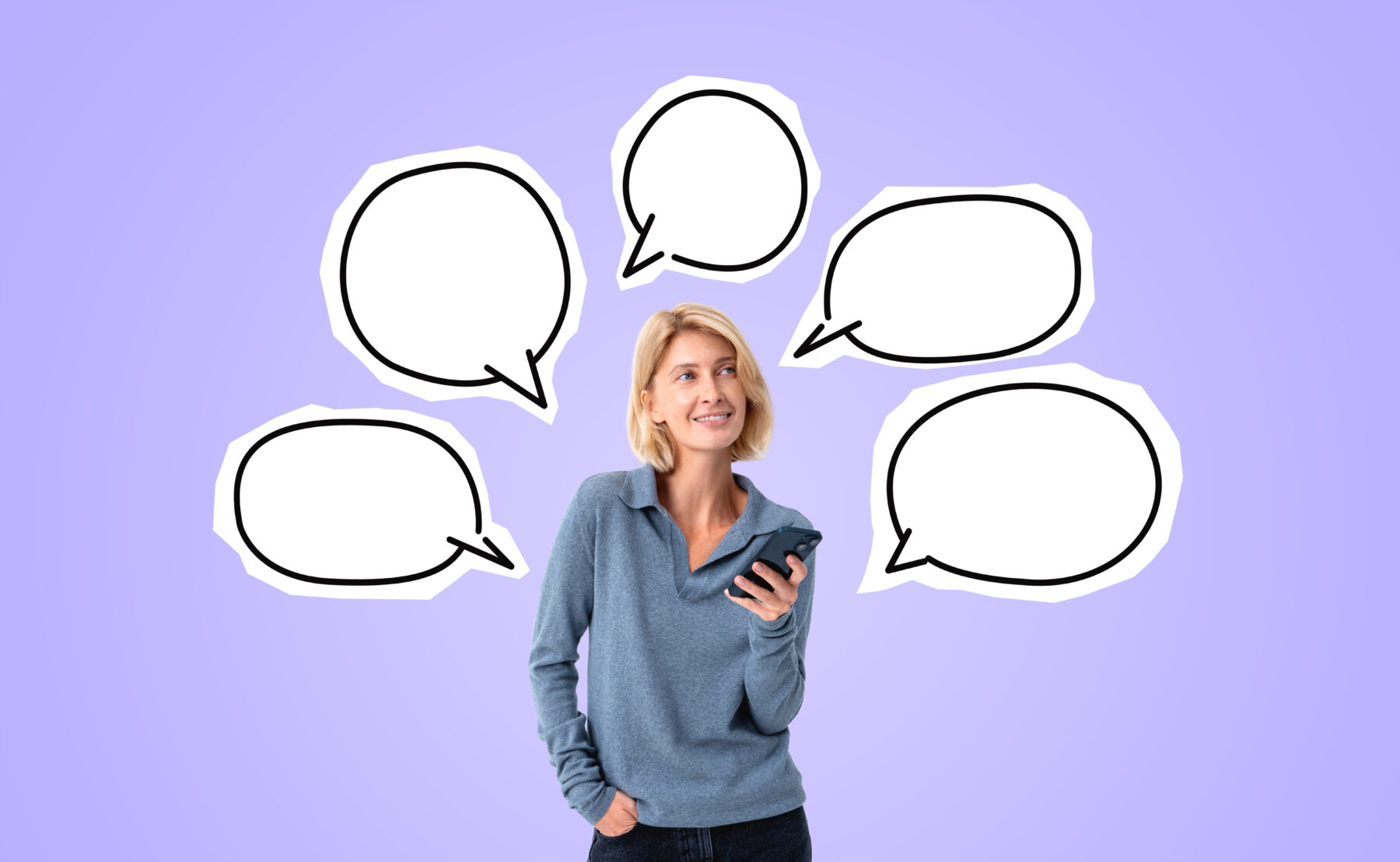 Smiling young woman with phone in hand, copy space speech bubbles